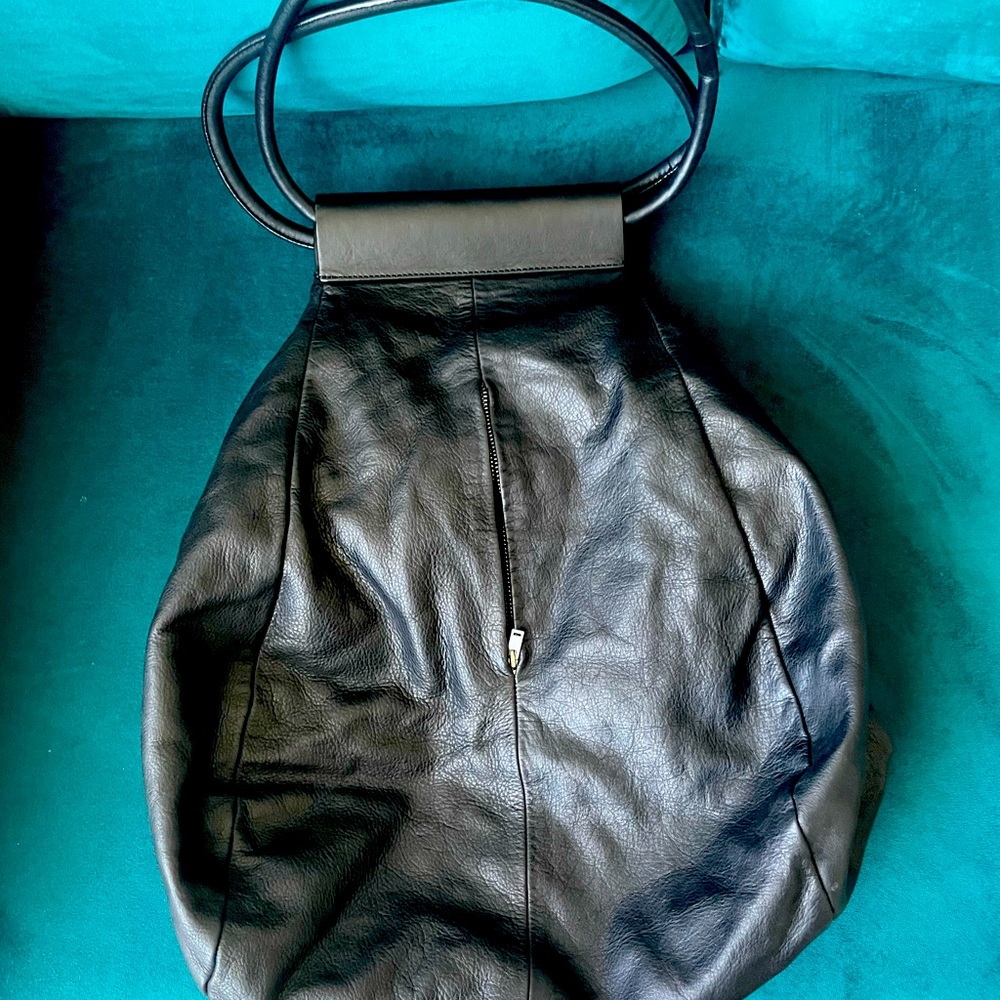 Lovely jumbo slouchy leather bag with silver hardware.